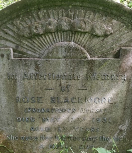 Weathered and decorated headstone of Rose Blackmore