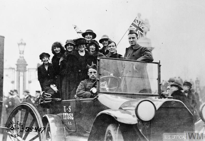 Armistice celebration group of people in a car