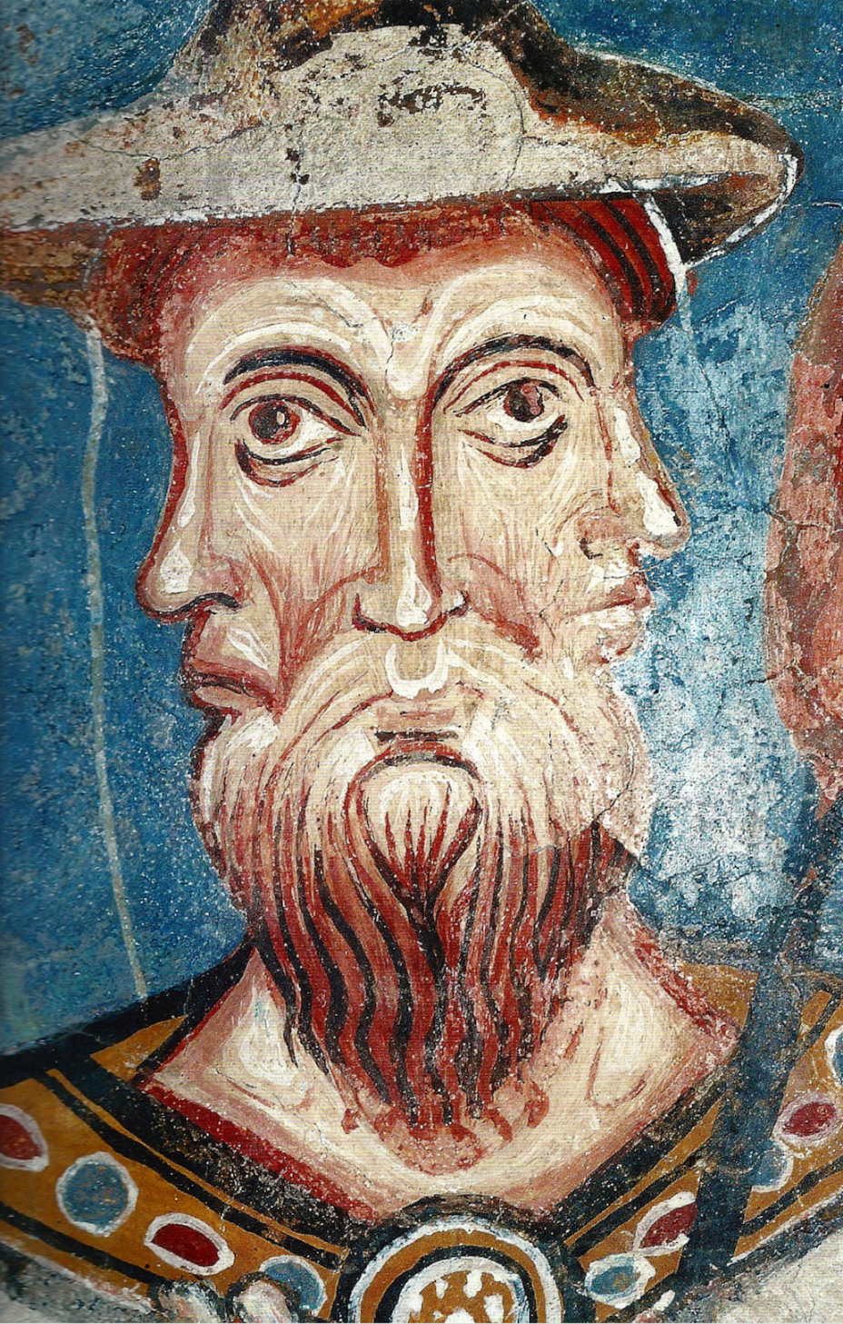 Painting of Janus, showing bearded three faced man in a hat. Looks like it might be a fresco. 