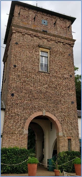 Red brick tower of around three storeys